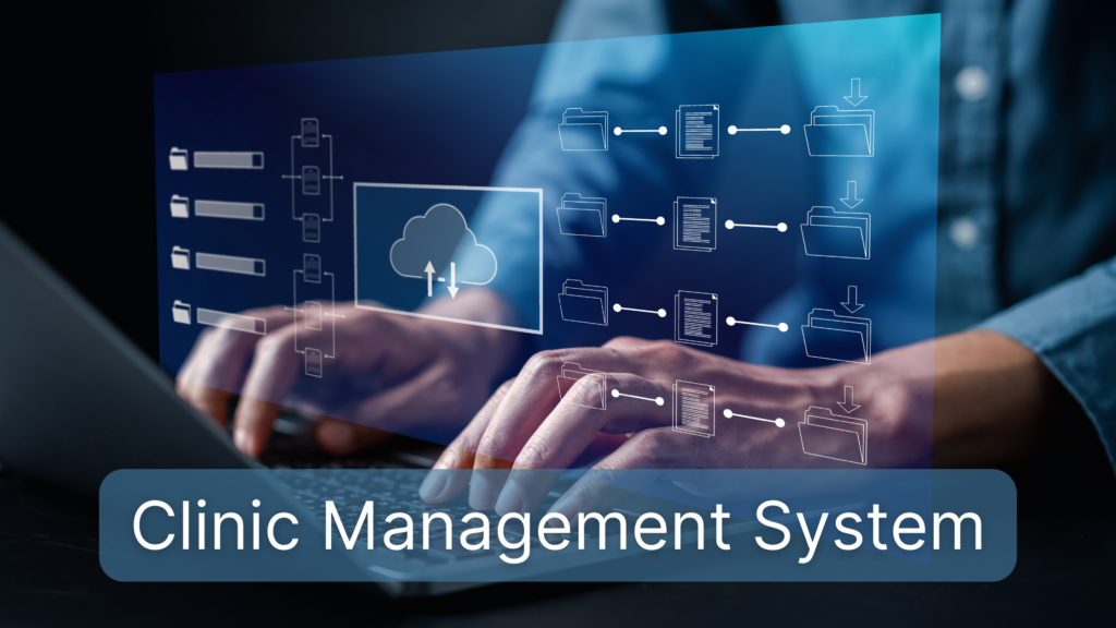 clinic management system shown on screen popping out of a laptop that a man in a jeans shirt types on