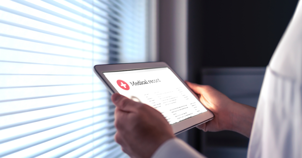 electronic medical record example on screen in someone's hands