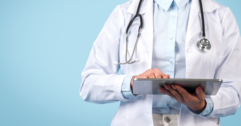 electronic medical record template on screen in hands of female doc